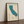 Top golf courses of California print framed on a wooden floor