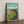 Dornoch golf print framed on a wooden floor