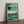 Sawgrass golf print framed on a wooden floor