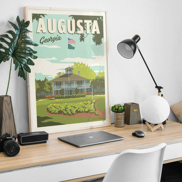 Augusta Clubhouse poster on desk with lamp
